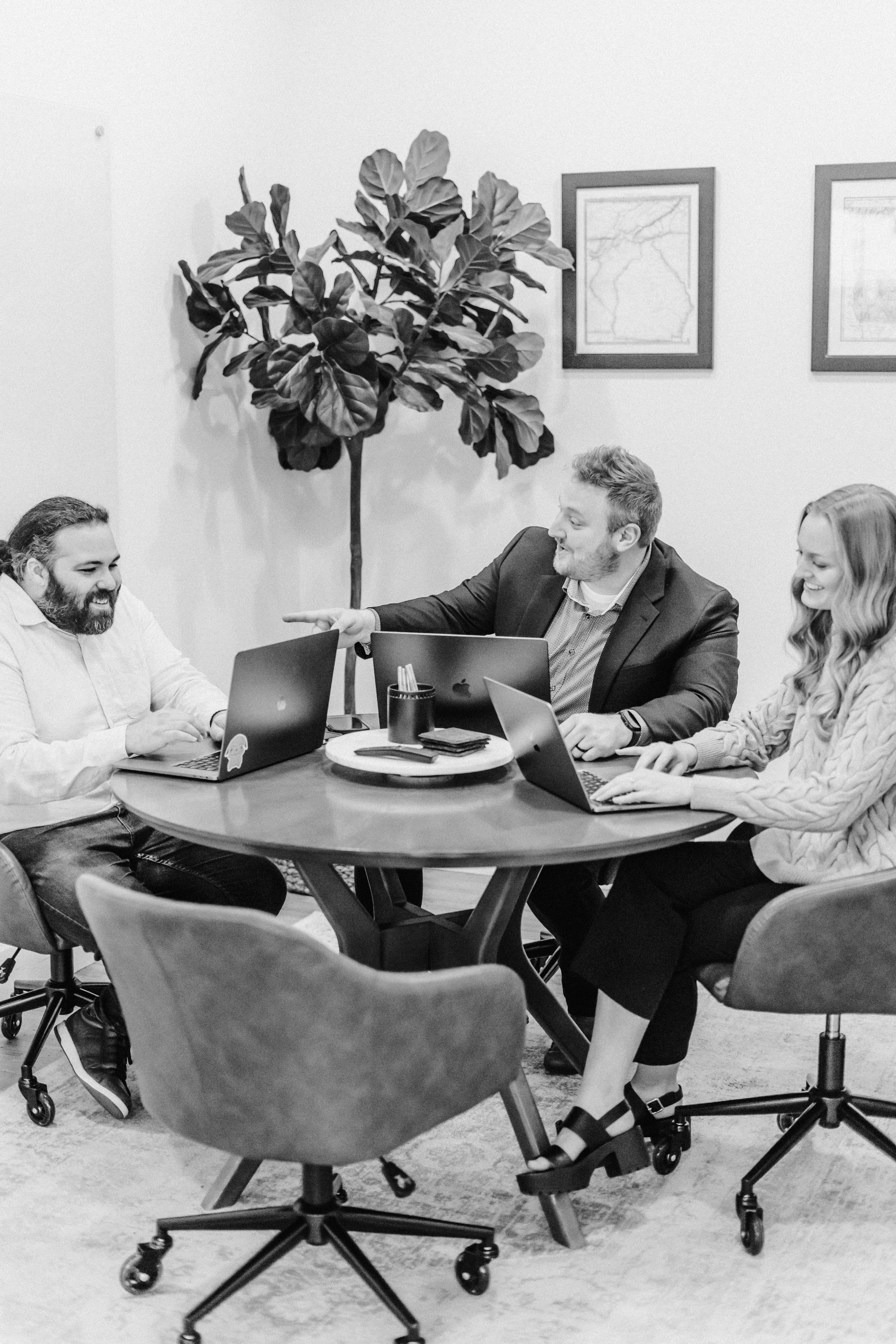 The Five One Nine team collaborating around a meeting table